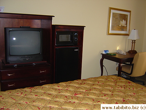 The entertainment unit in our room in Holiday Inn has a microwave and fridge