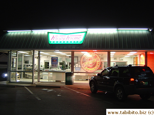 Krispy Kreme store.  The pregnant lady who later volunteered to take our picture was sitting in that van 