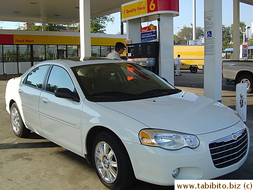 KL filling up the tank of our rental car before turning it in
