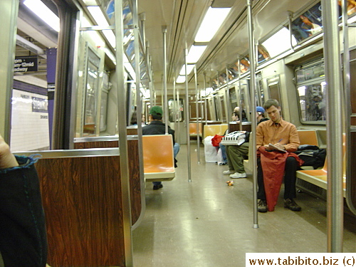Inside a NY subway train late at night