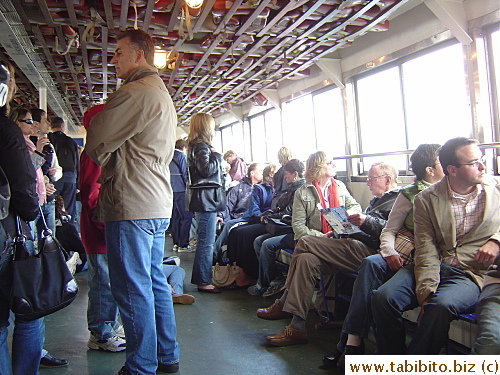 Tourists fill the ferry