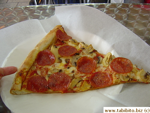  Pepperoni and mushroom pizza, yummy!  The slices were big too