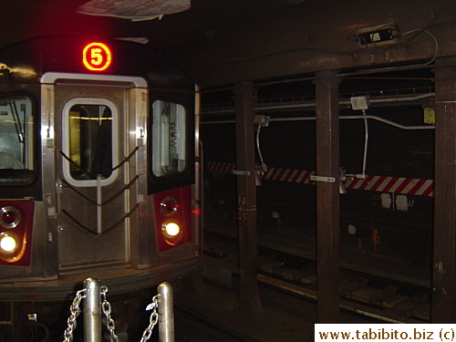 A track under construction but opens for business.  Our 1 train suddenly became a 5 train