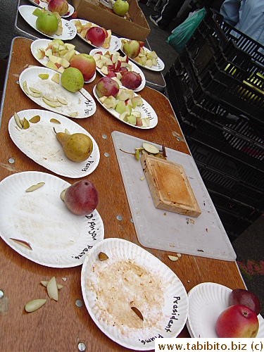 Apple and pear tasting in the market.  We tried the apples and cherry tomatoes from another stand