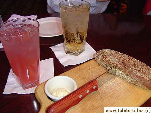 Our drinks for the meal: my pink lemonade and KL's ginger ale and that yummy honey bread