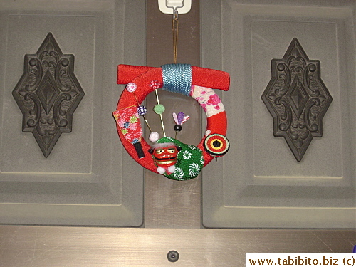 This one features a paddle which is used in the New Year game Hanetsuki
