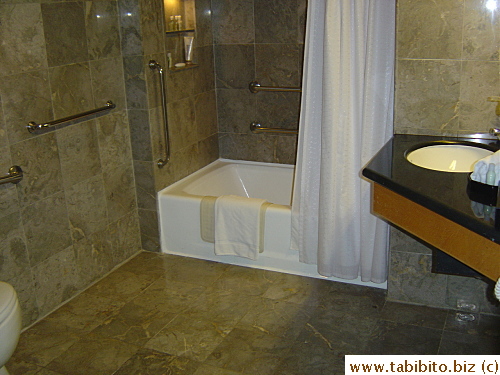 The bathroom is quite spacious. I wish they had dedicated more space to the tiny room instead of the bathroom