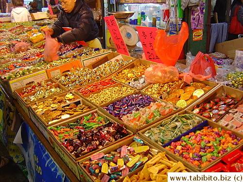 Since red and gold are auspicious colors for the New Year, many candies are wrapped with gold foil to be put inside a candy tray, one of the New Year items in just about every household