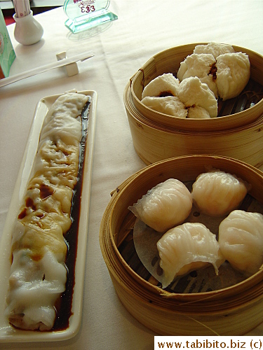 Steamed pork buns, prawn dumplings and rice rolls with beef filling