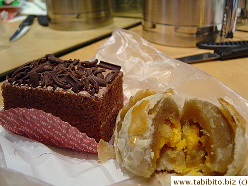 Chocolate cake from Maxim's cake shop and a traditinal snack from Hang Heung Bakery which specializes in Chinese wedding sweets and old-fashioned Chinese sweet snacks