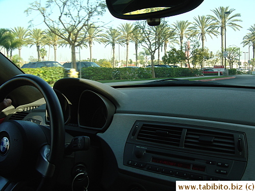 The driver of the roadster takes KL to his house