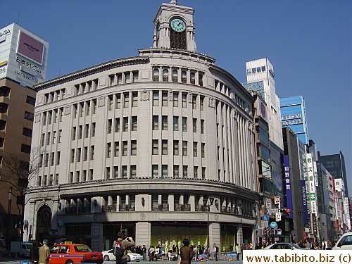 The famous round building (San-ai) and clock tower are located on the Chuo-dori and Harumi-dori intersection