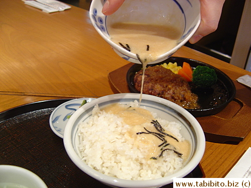 KL pours gooey yam phlegm on his rice.  Such a brave man!