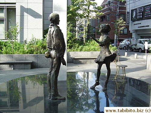 A dancing couple statue at the back of the Ward Office