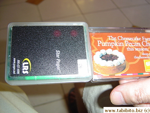 Many restaurants use these pagers that flash when waiting customers' tables are ready. This one's from The Cheesecake Factory