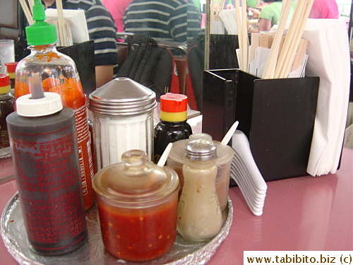 Do-it-yourself condiment and utensils commonly seen in Vietnamese restaurants