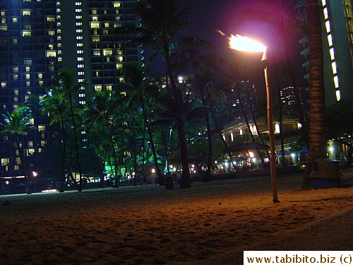 Looking back at Hilton from the beach at night