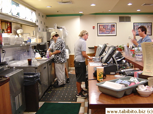Staff behind the counter at CJ's
