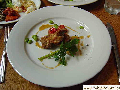 Entrée/main.  Note how the ginormous plate dwarfs the normal sized fork and knife