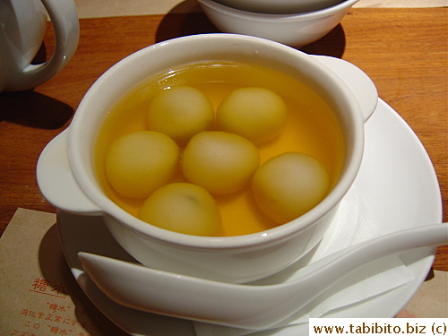 Sticky rice balls with sesame filling in ginger broth 630Yen/$6