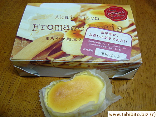 A box of four mini cheesecakes