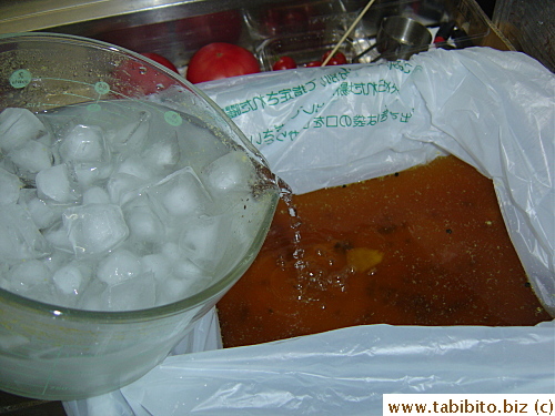 6-8 hrs before roasting, the brining liquid goes into a bucket and is joined by another gallon of heavily iced water.  I lined my bucket with a plastic bag for mess-free cleanup