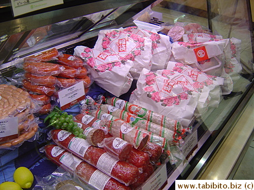 A few bags of sausage Happy Bags left in the cold case
