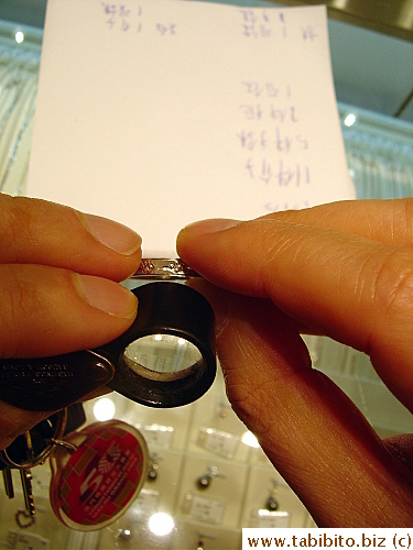 KL examined the inscription on a ring 