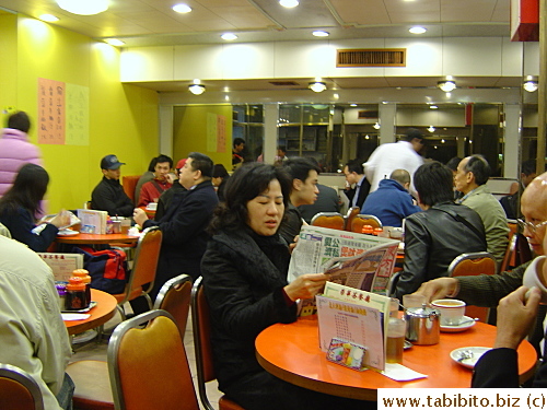 Typical diner setting. The table in the foreground was occupied by three unacquainted strangers.  A fourth person later joined them which just to show you how common and acceptable it is to share tables especially at peak time