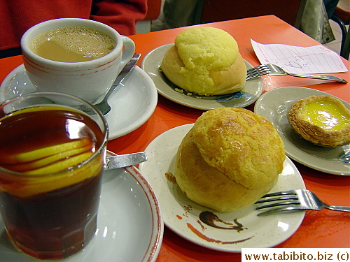Our breakfast: Coffee and lemon tea each HK$11/US$1.4  The buns were only HK$3 each and the egg tart HK$3.5, about US 40cents 