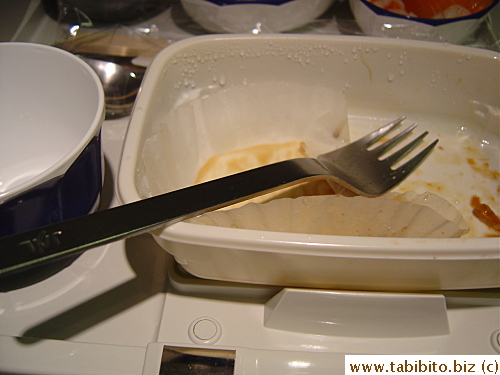JAL is smart enough to know that metal utensils canNOT be used to bring down a plane, thus they are still being served in economy class