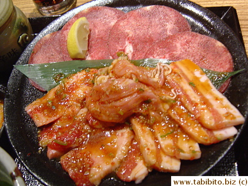 The meat plate is made up of beef tongue, beef, pork and chicken