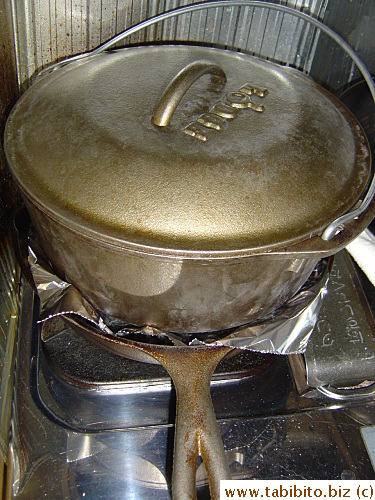 This is how I make panini at home: heavy cast iron pot over the sandwich in a cast iron pan