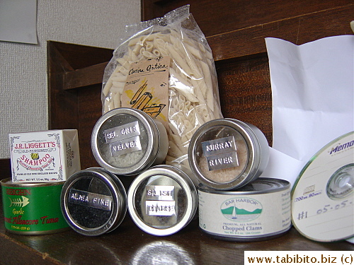 Goodies: penne, canned tuna and clams, soap, salt, CDs