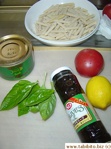 Ingredients for the tuna salad: penne, tuna, basil, olives, tomato, lemon zest and juice, onion and olive oil (not pictured)