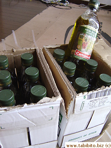 A dozen bottles of Ex V olive oil. This is not the brand I usually use, but the sale price makes it 30% cheaper than the one I use, so they are a good deal