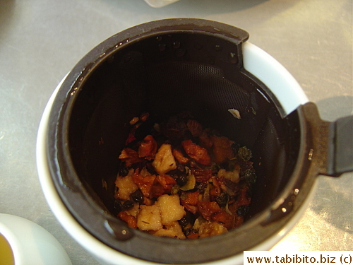 Leaves and dried fruit flavor my tea