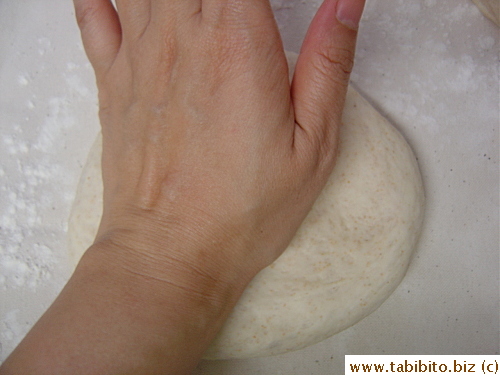 Then flatten each ball with the heel of your hand