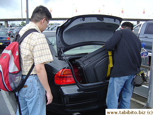 Loading bags into the trunk