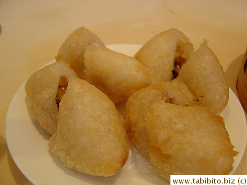 Deep-fried stuffed glutinous balls.  The shell's crispy and the stuffing tasty