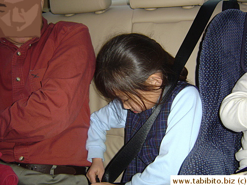 The kid is well trained in seatbelt rule, the first thing she does in the car is buckle up