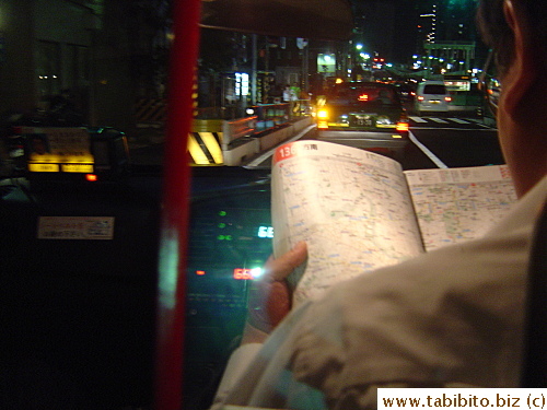 After getting off in Shinjuku, we then caught a taxi which didn't have a GPS (gasp).  The driver consulted a map book to find our street