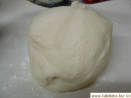 A beautifully kneaded and risen dough just taken out from the bread machine