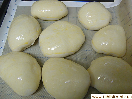 Each is brushed with beaten egg before baking