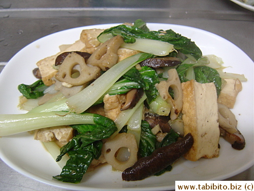 The bokchoy was made into a stirfry dish with chopped garlic, dried mushrooms, fresh lotus root and fried tofu seasoned with just salt and soy sauce
