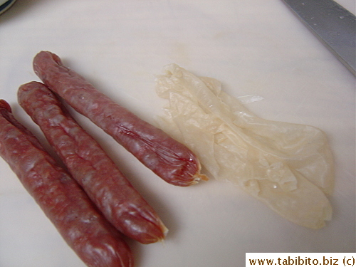I always boil the sausages in water for 30 seconds to remove the casing