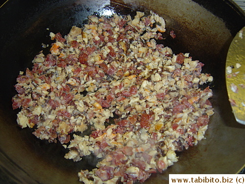 Frying the filling in the wok for a few minutes