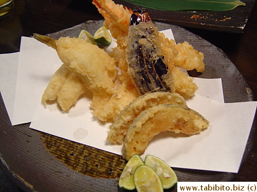 Tempura's sold by the piece: prawn 450Yen/$4, fish 350Yen/$3, squid 250Yen/$2.2, eggplant 180Yen/$1.6, pumpkin 150Yen/$1.3