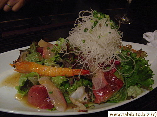 A large plate of sashimi salad 920Yen/$8