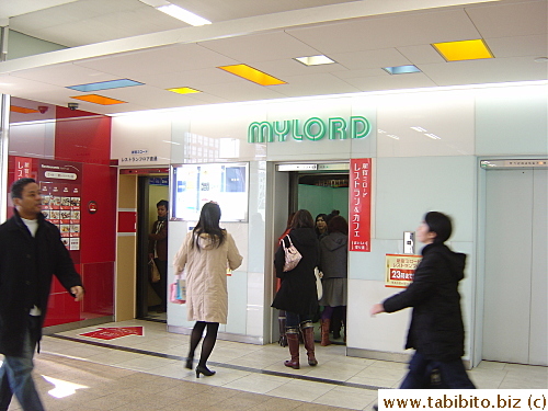 Elevators at Shinjuku south exit take people to shops in Mylord